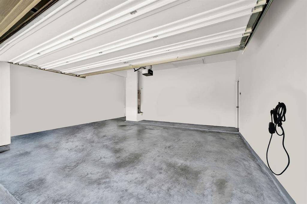 Extra storage room in this garage.  EV charger included.