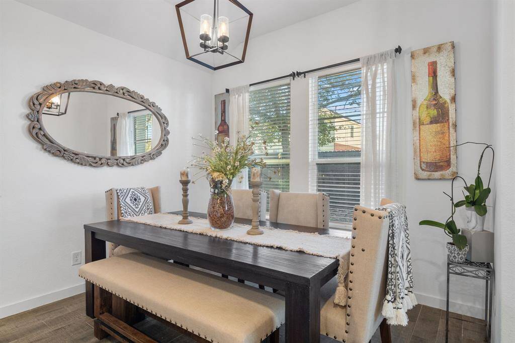 The dining space has a private feel as it is set away from the living room area.