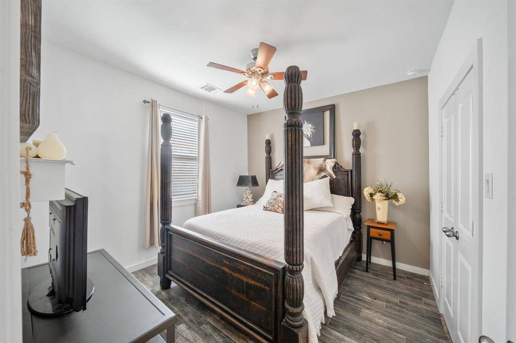 The second bedroom separated by the guest bathroom creating privacy.