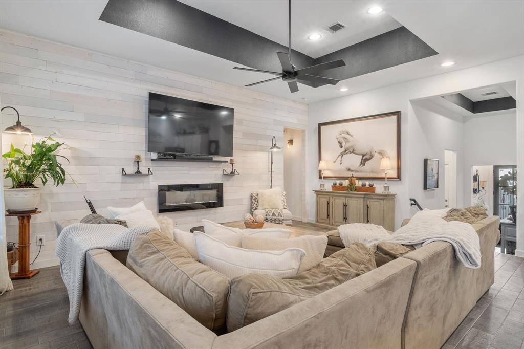 Recessed ceiling opening up the living area for a grand feel.
