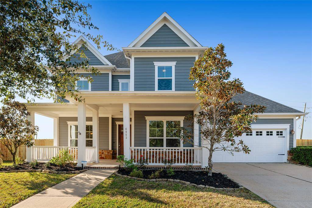 Beautiful and welcoming craftsman style elevation.