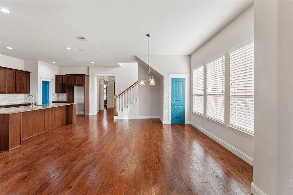 Imagine having a complete breakfast of pancakes and eggs in the eat-in kitchen. Durable wood flooring ensures quick and easy cleanup if there should be a dining mishap!
