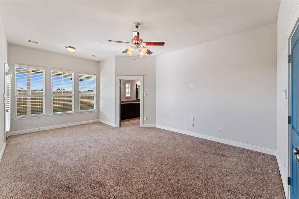 Several wide windows allow tons of shimmering natural light into the master bedroom with access to the outdoor sprawling patio. Sit by the window on winter mornings and delight in reading your favorite book on your tablet!