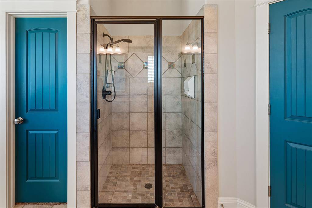 Run a warm and soothing aromatherapy bath for soaking, or indulge the senses in a hot and invigorating shower in the glass and tile enclosure!