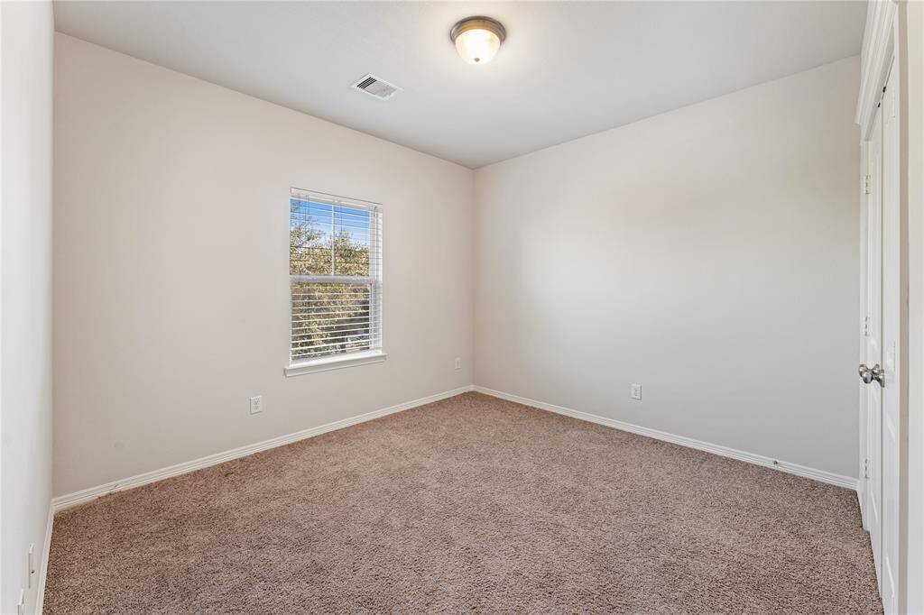 Spacious bedrooms each feature a sizable closet and close proximity to 2 full bathrooms upstairs.