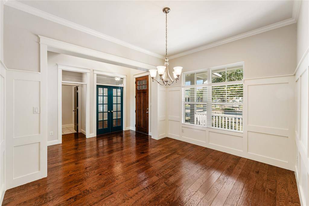 Dining room windows overlook front porch. Just across from dining you will see the study as well as a half bath!