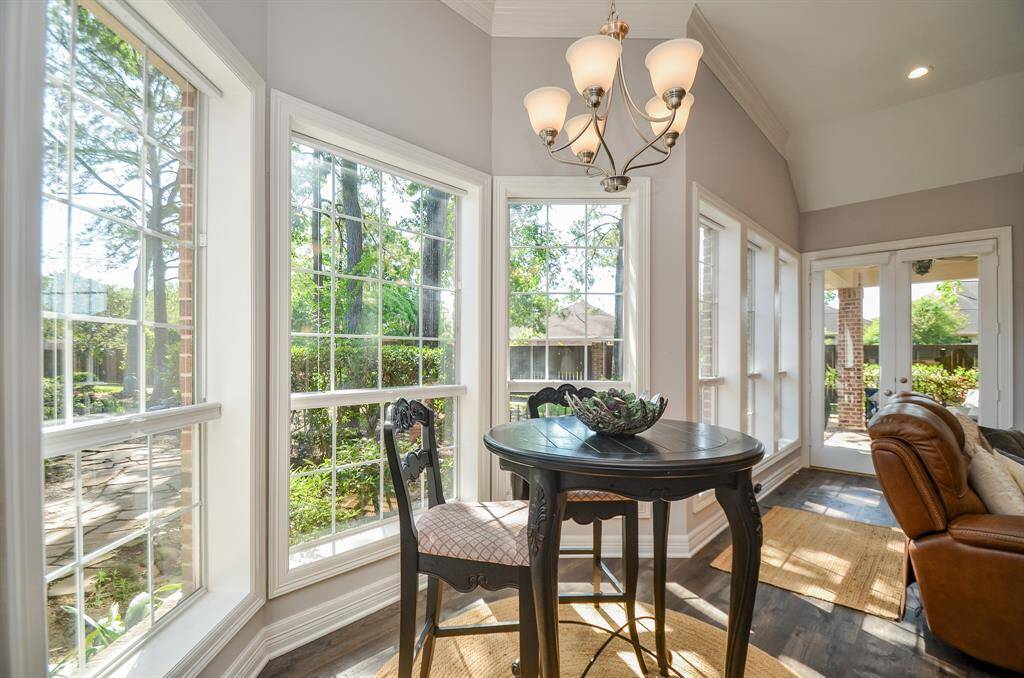 Breakfast nook and wall of windows