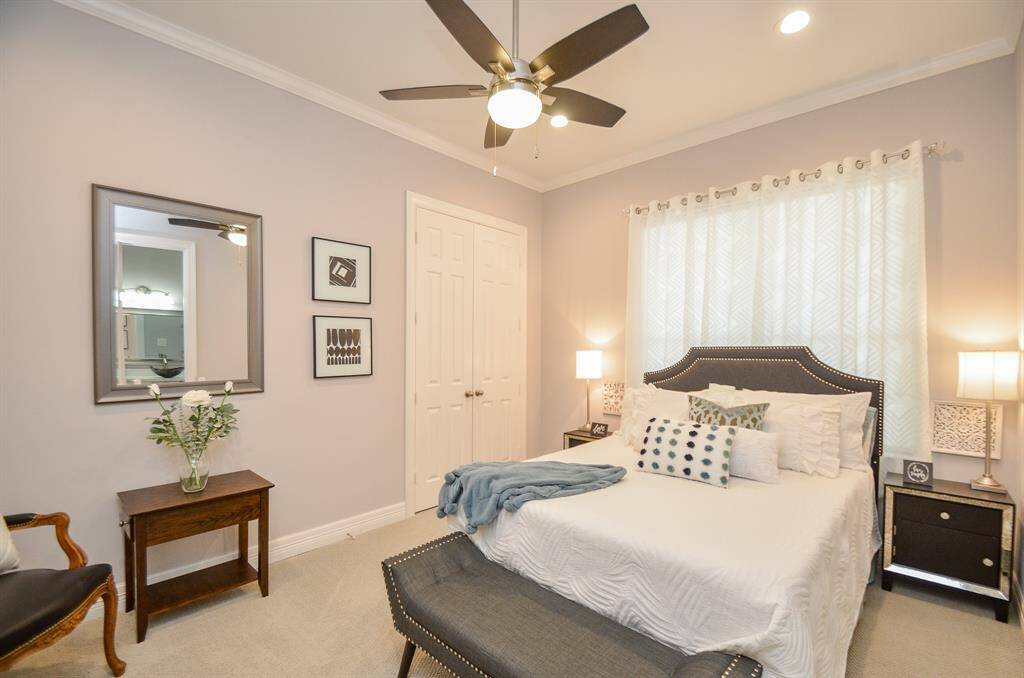 The second bedroom is a guest suite with a private bathroom.