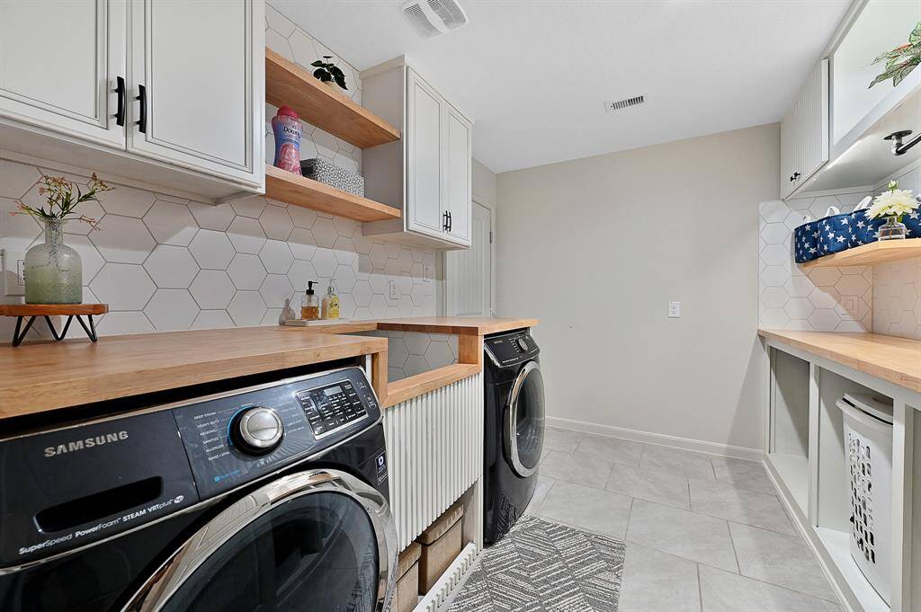 Laundry Room with Pet washing station.