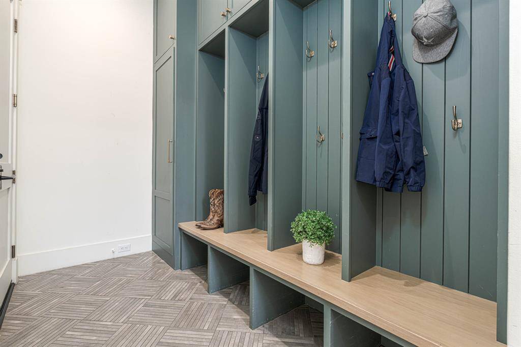 Mudroom with built-in storage lockers, , creating a functional and welcoming entry space.