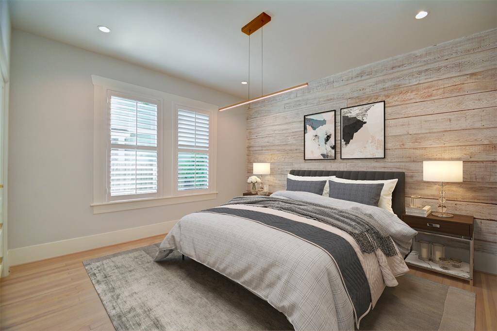 The trendy master bedroom with exposed shiplap
