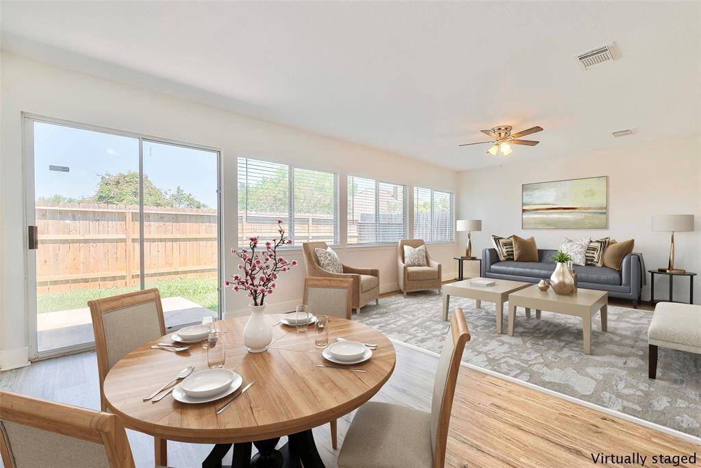 *Virtually Staged* Breakfast area looking out the living room
