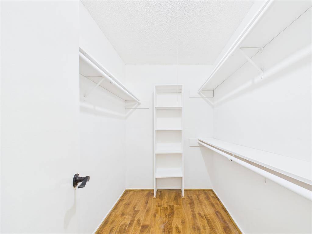 Primary features a walk-in closet and large bath