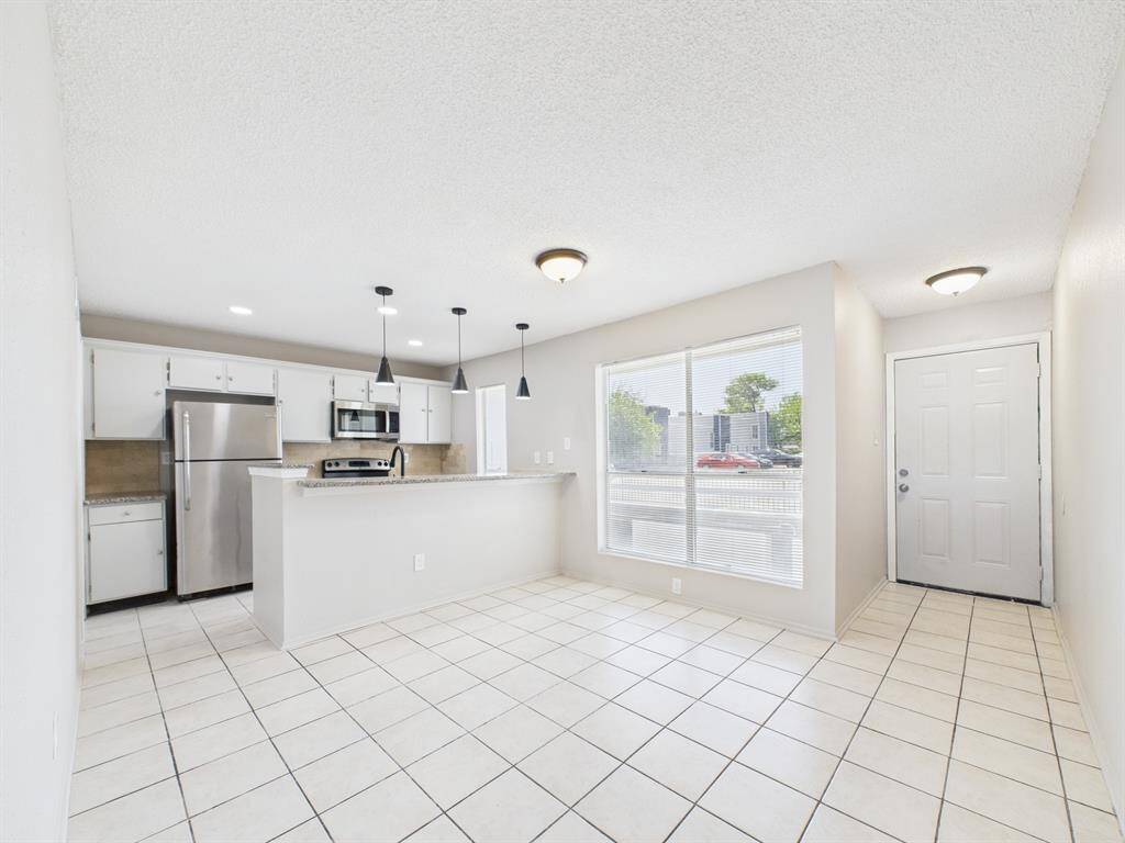 Stairway to the second floor is flooded with natural light thanks to the skylight