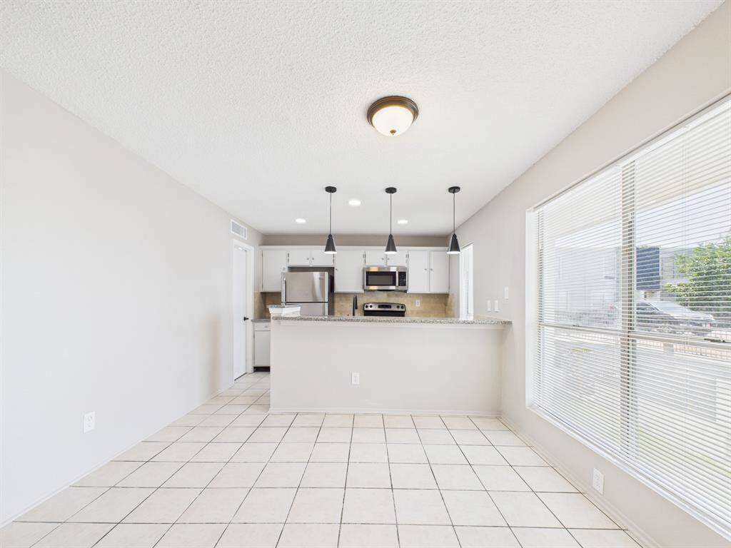 Neat and efficient Kitchen & Dining Area