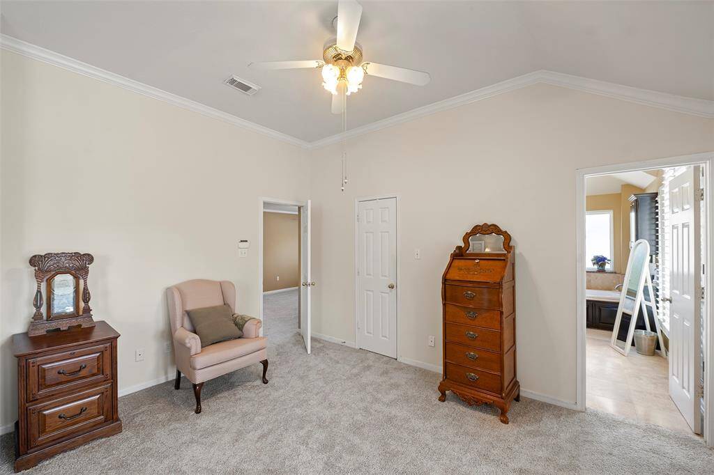 Welcome to the  upstairs Texas sized primary suite!