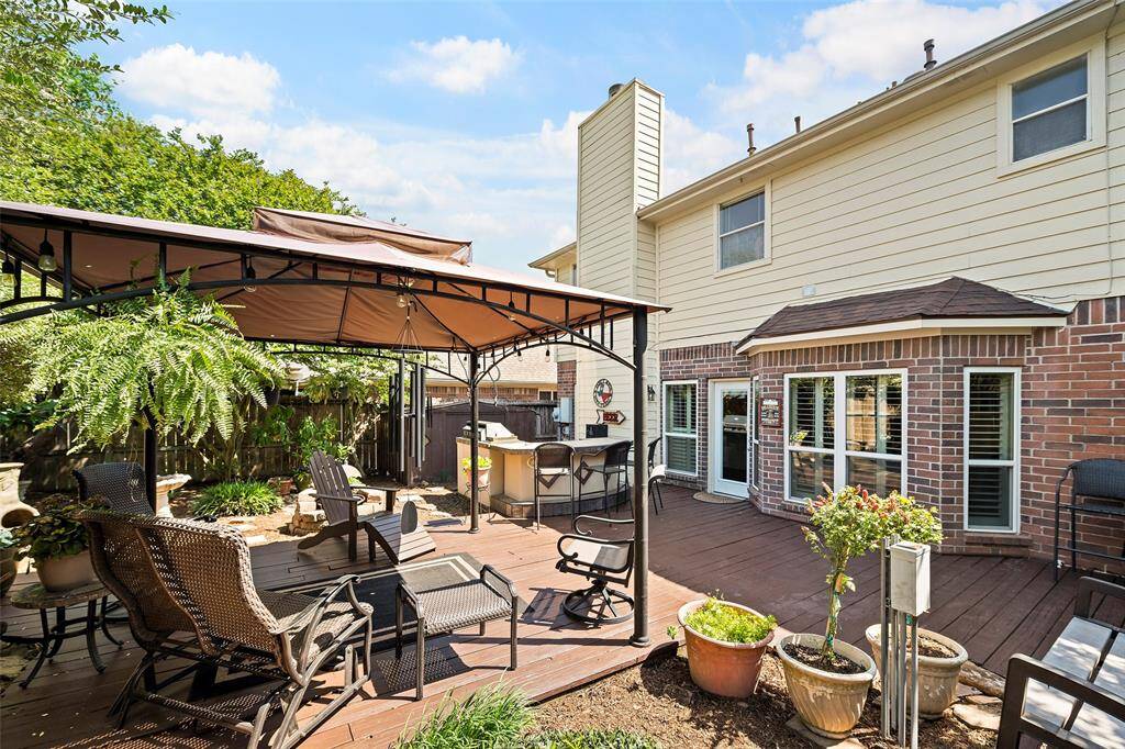 You'll love all the decking and patio cover.