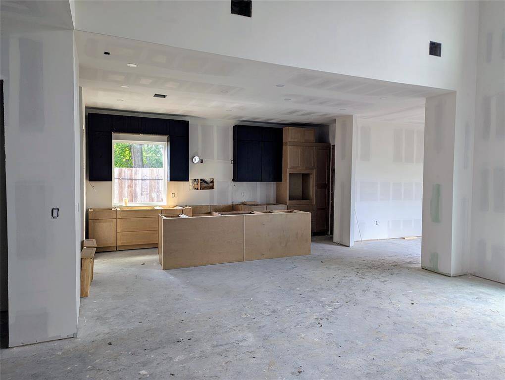 View of Kitchen from living room in progress April 5th