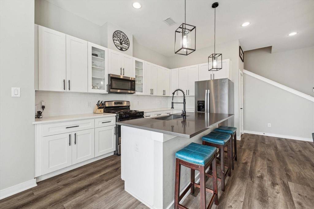 Kitchen with breakfast bar, first floor.