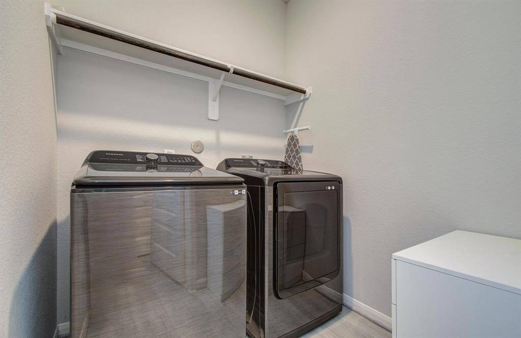 Laundry room off the hallway to office/flex room!