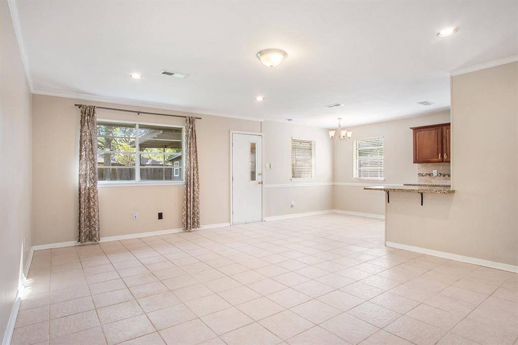 Another view of the open living dining and kitchen concept.