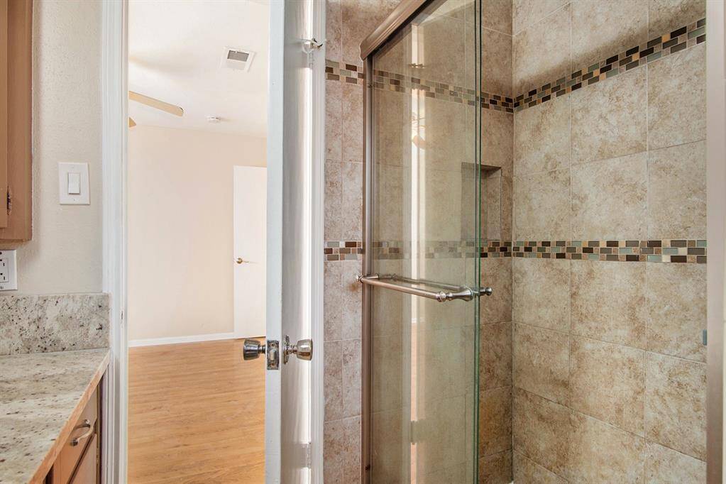 Primary bathroom with walk-in shower.