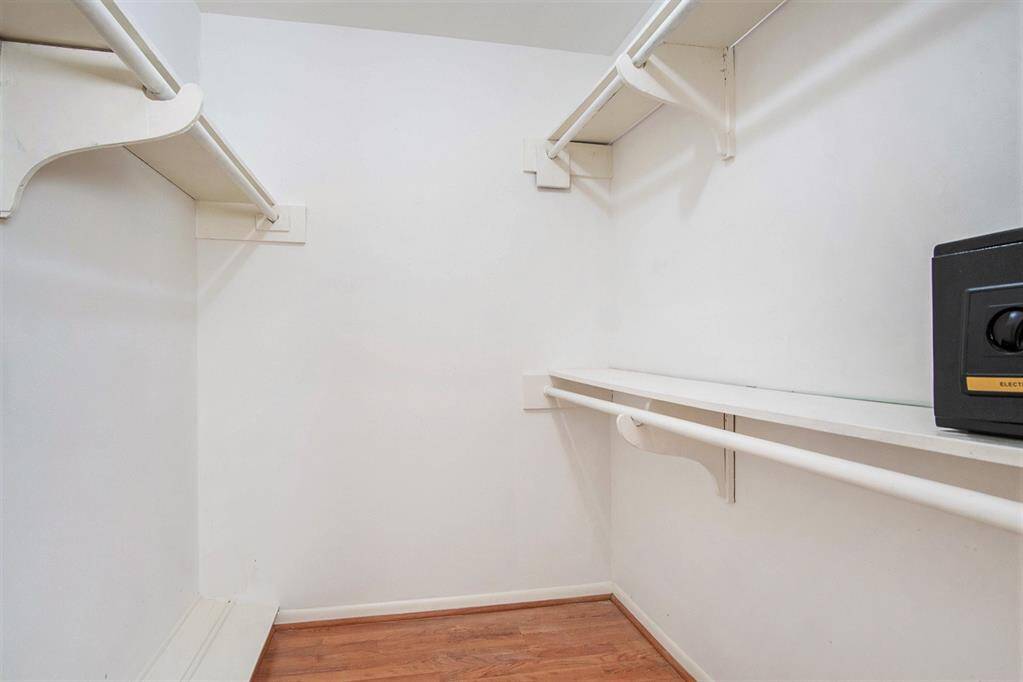 Plenty of space in the walk-in primary closet.