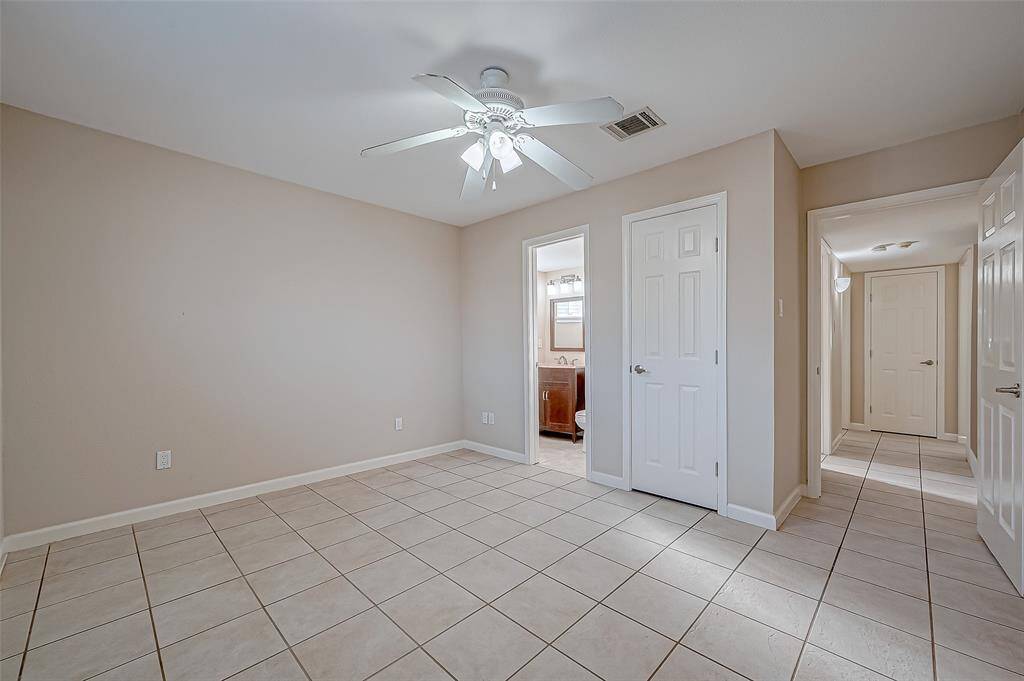 The primary bedroom boasts and ensuite half-bath.