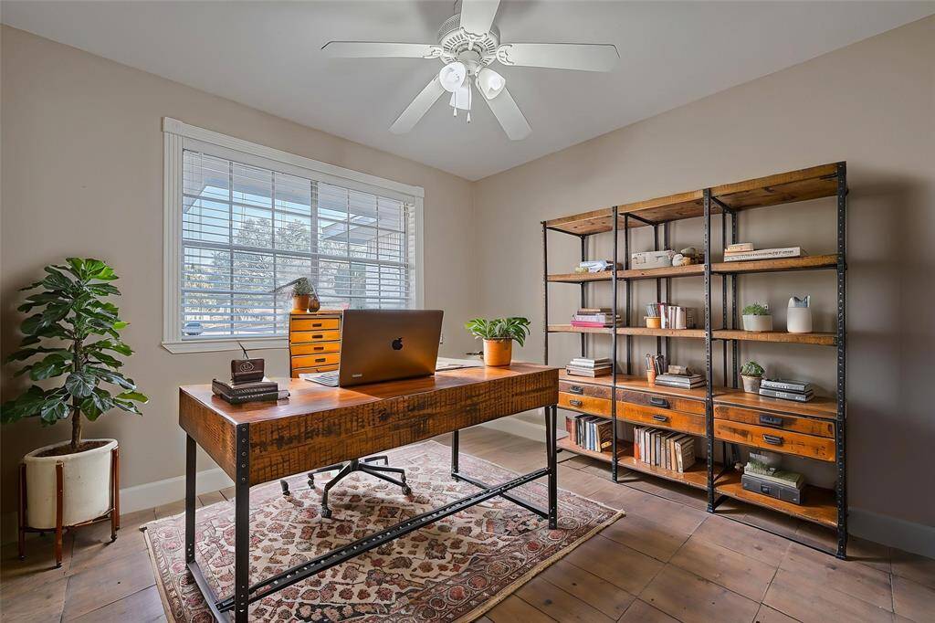 The front of the home features limitless opportunities, including potential as formal dining room, home office, home gym and more! *Virtually Staged*