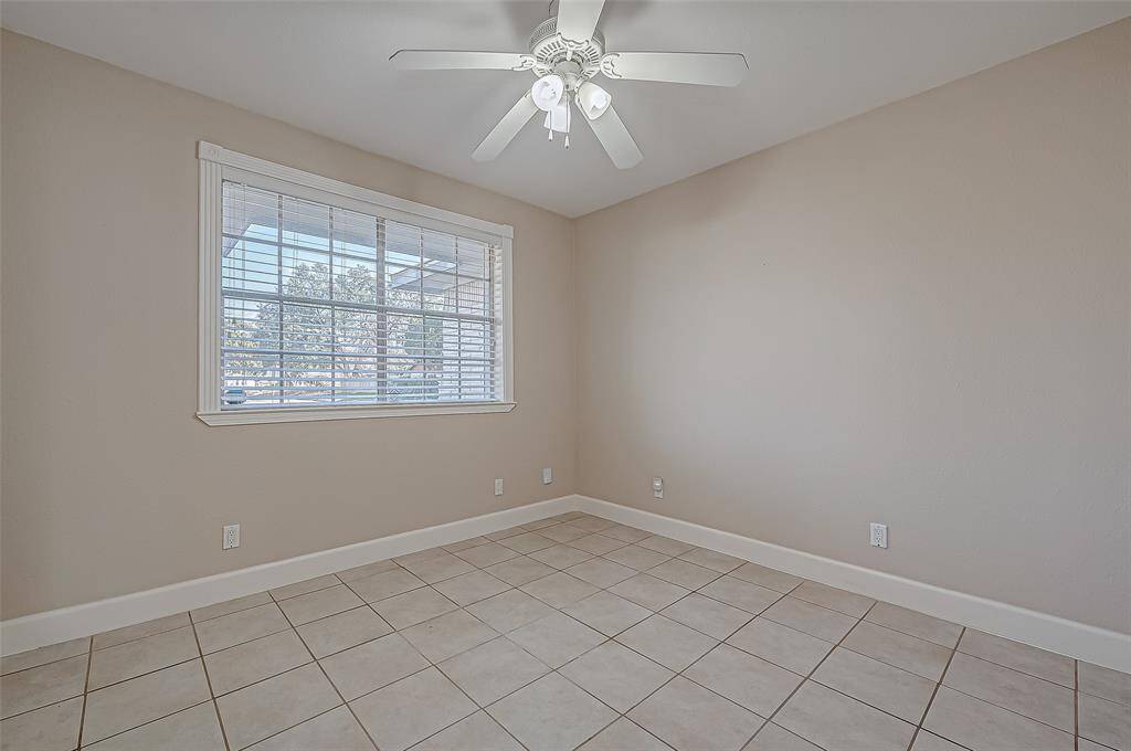 The front of the home features limitless opportunities, including potential as formal dining room, home office, home gym and more!