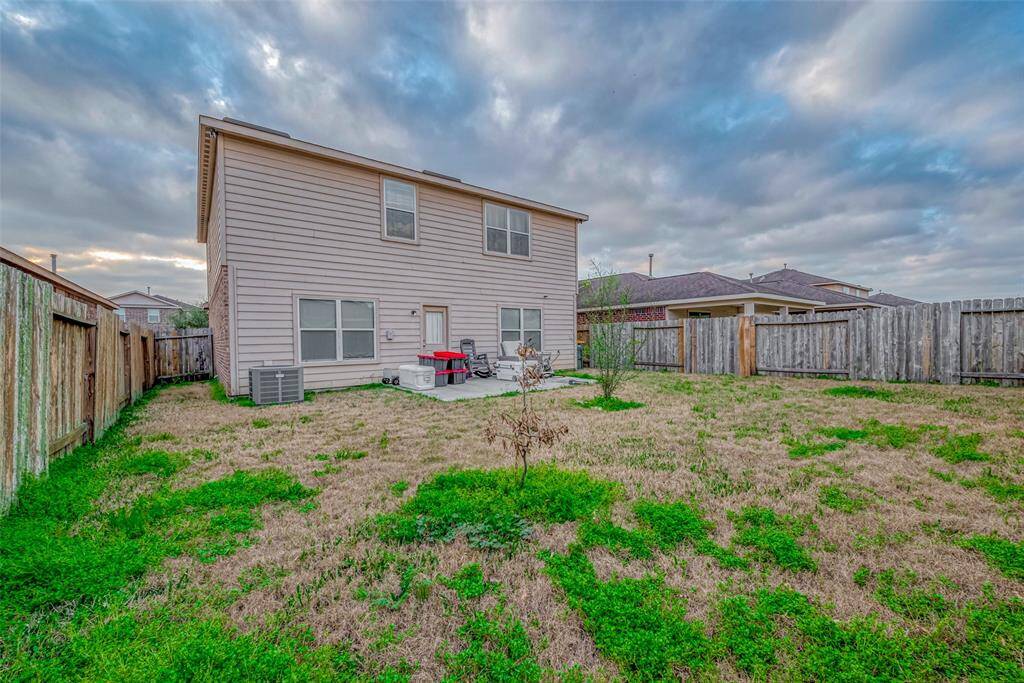 A small uncovered patio offers a starting point for outdoor relaxation or entertaining. With room to expand, this space is ready for customization.