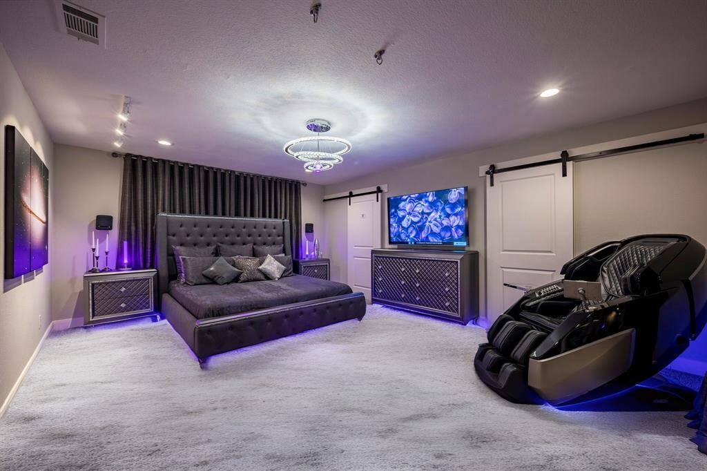 Primary bedroom of this updated smarthome