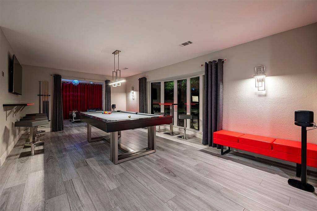 Formal living is flex space for pool table or dining