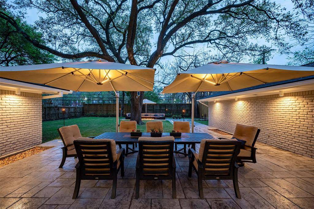 Mature oak tree overlooks the expansive yard