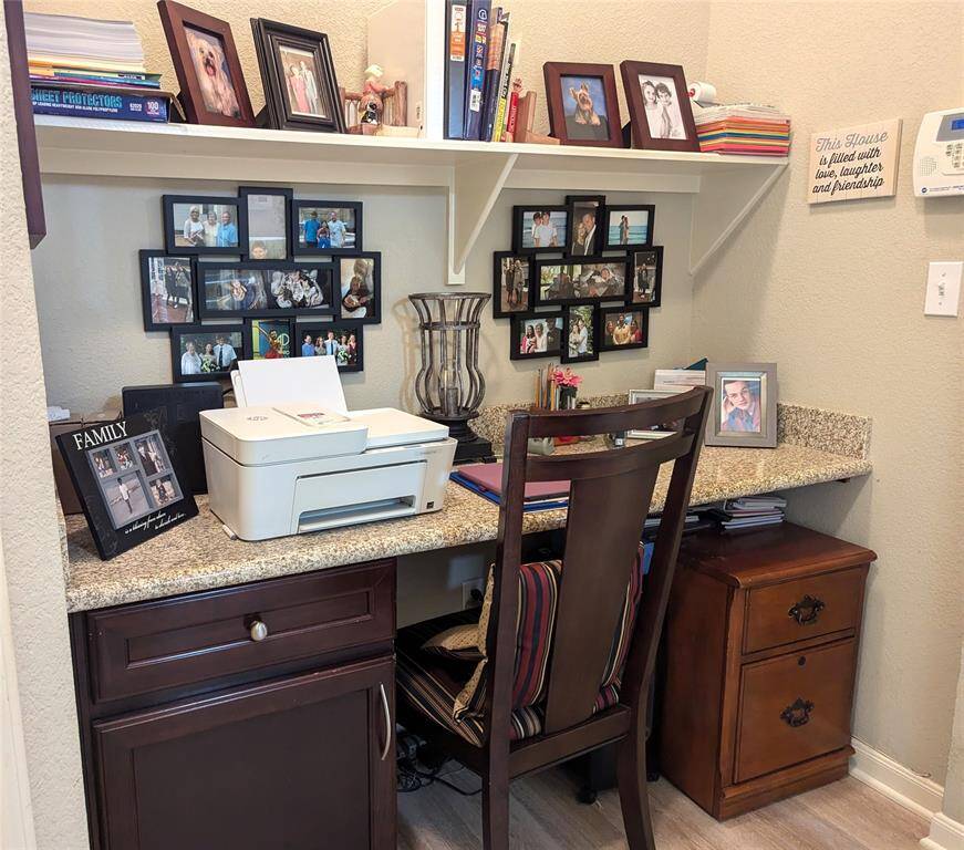 Note the built in study in its own space! Granite counter top and shelving.