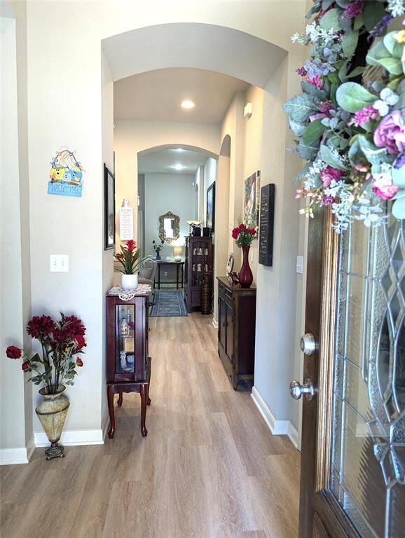 Leaded glass front door with side lights, welcomes you into your lovely home.