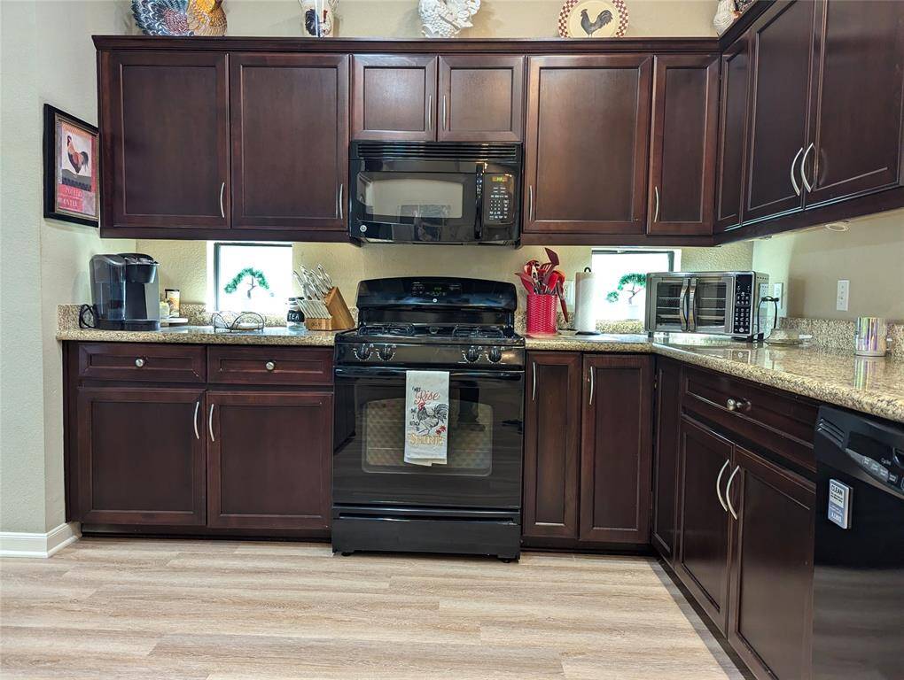 Nice size pantry in the kitchen. Gas stove. Microwave and dishwasher.