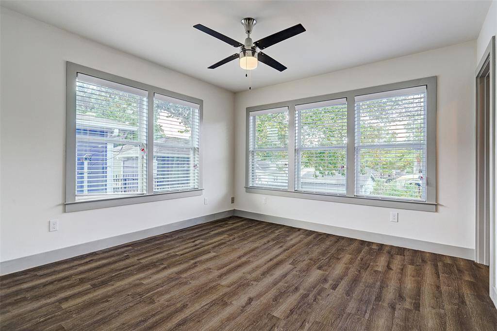 LARGEST Fourplex -Large bedroom with ample natural light, a ceiling fan and walk in closet!