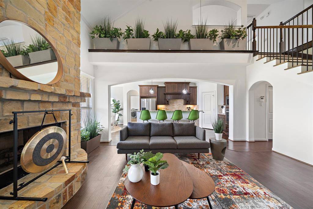 Open floorplan and wood flooring throughout.