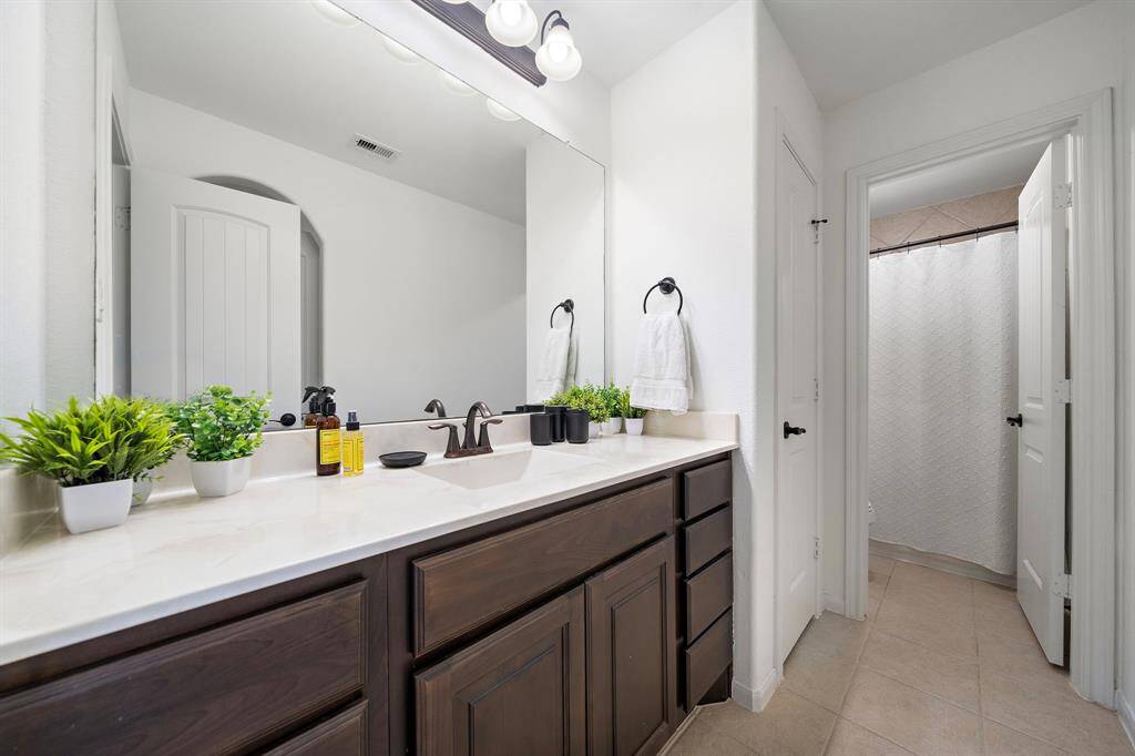 2nd full bath upstairs with tub/shower combo.
