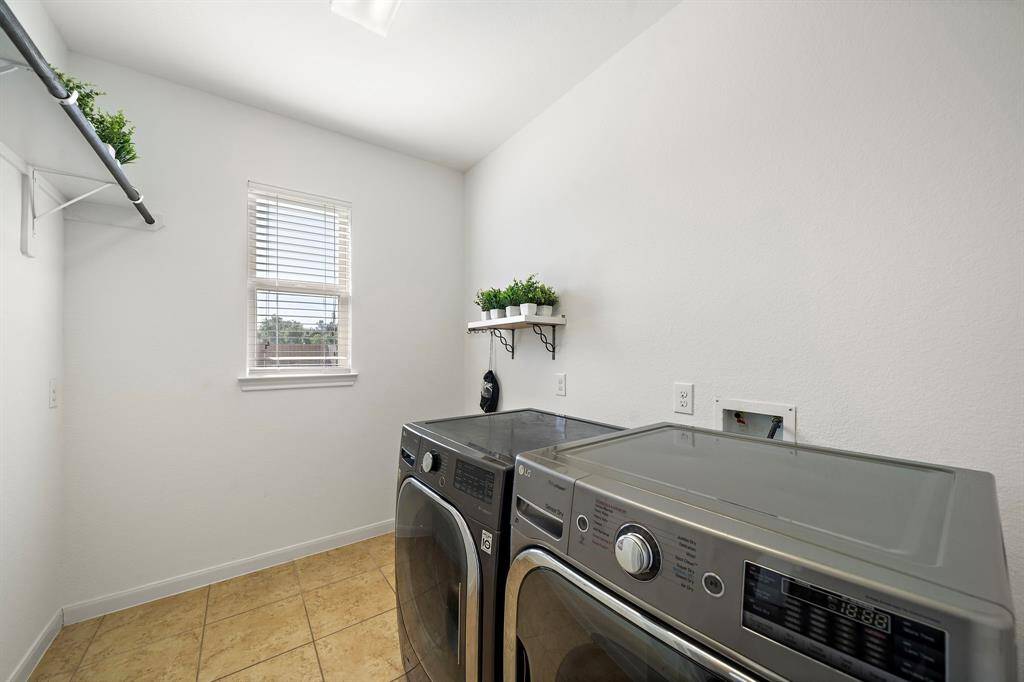 Laundry room is downstairs and comes with a washer/dryer.