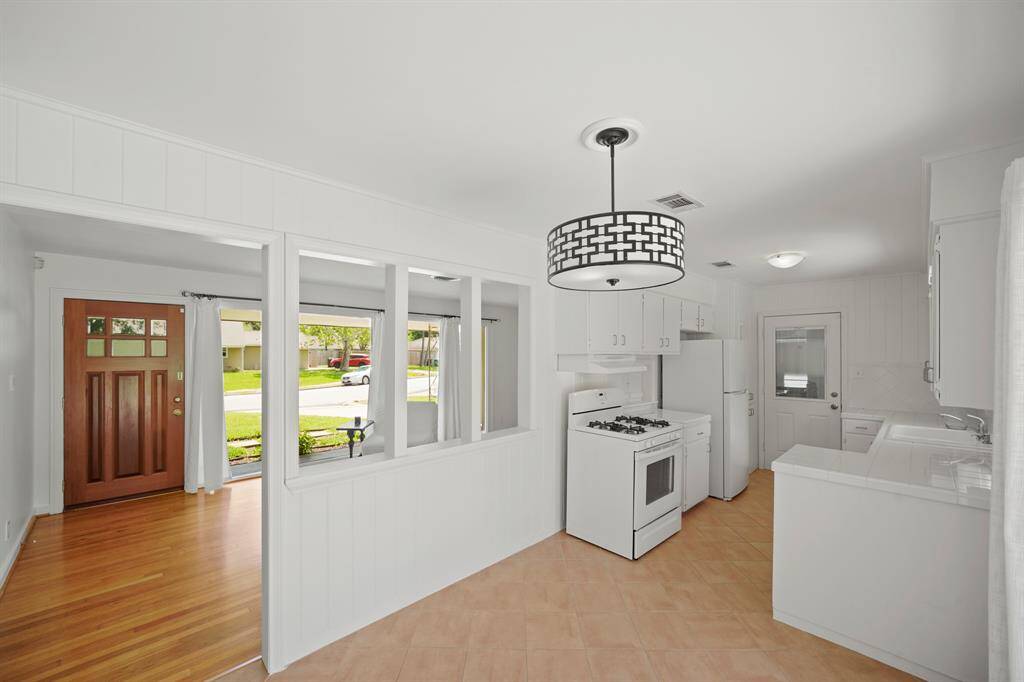 The Breakfast Room opens to the Living Area, offering a Flowing Floorplan.