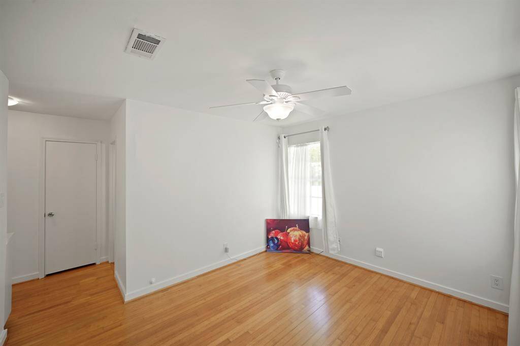 Additional Amenities in the Primary Bedroom include Updated Low E Windows (on Northeast Side of theBedroom) that view the Side Yard, and Ivory Hued Velvet Style Tab Drapes and White Sheers.