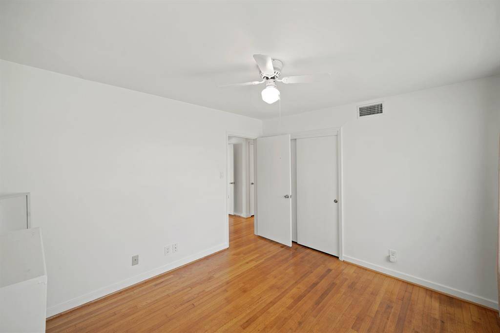 A White Ceiling Fan with Globe is also offered in the Third Bedroom.