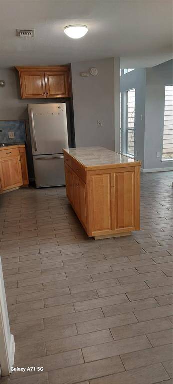Last view of the Kitchen, the Formal Dining Room is adjacent down that hallway