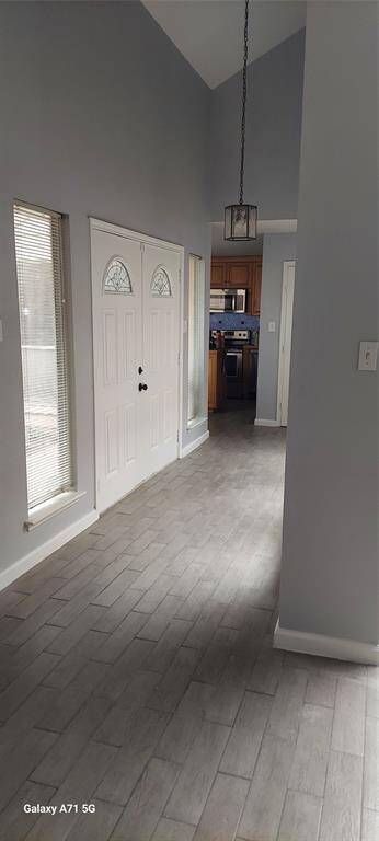 Front Door Entry, Kitchen to left and Living Room to the right