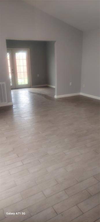 Living Room View, includes Den or Office Space Entry