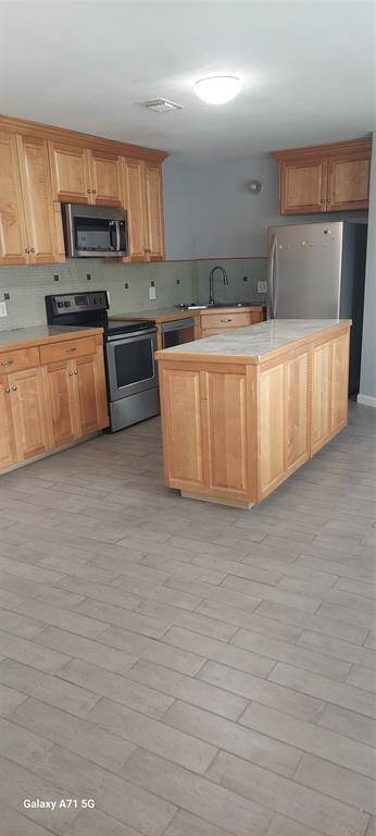 Another View of the spacious Kitchen, w/ room for a breakfast table