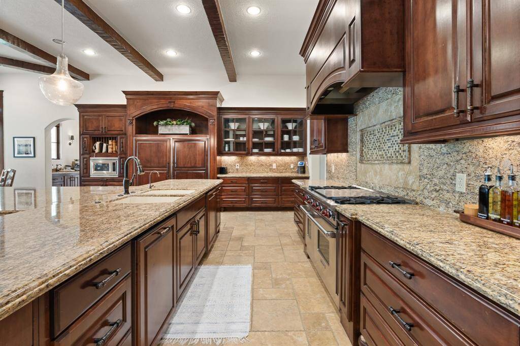 The kitchen showcases a stunning countertop, offering both functionality and style to the heart of the home.