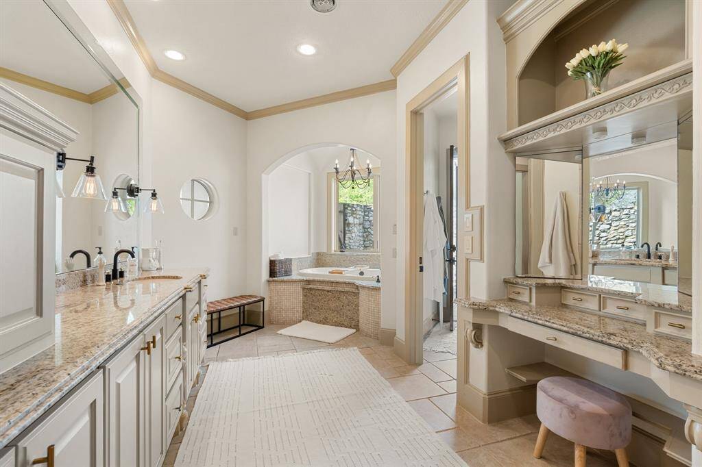 Step into the expansive master bath, where indulgence and luxury converge in a space designed to pamper and rejuvenate.
